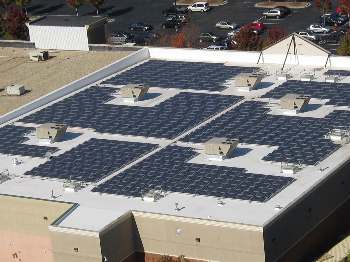 REI store with solar panels on the roof